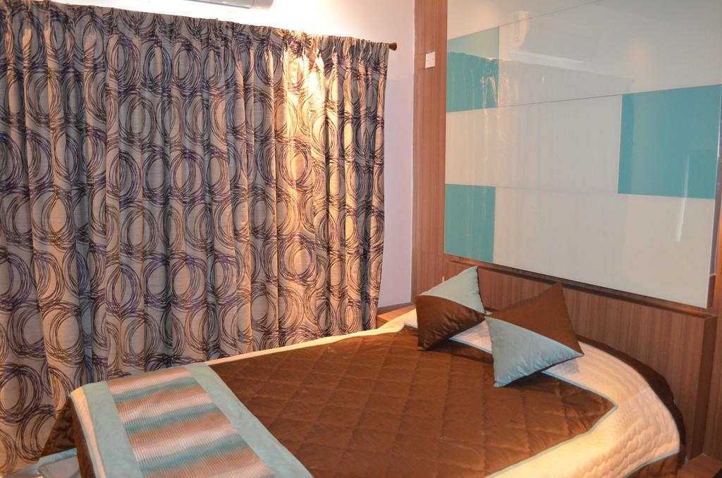 Itsy Hotels Hiland Suites بنغالور الغرفة الصورة